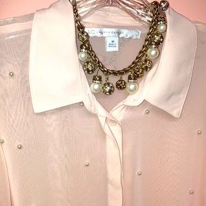 From Office to Evening pearl embellished blouse